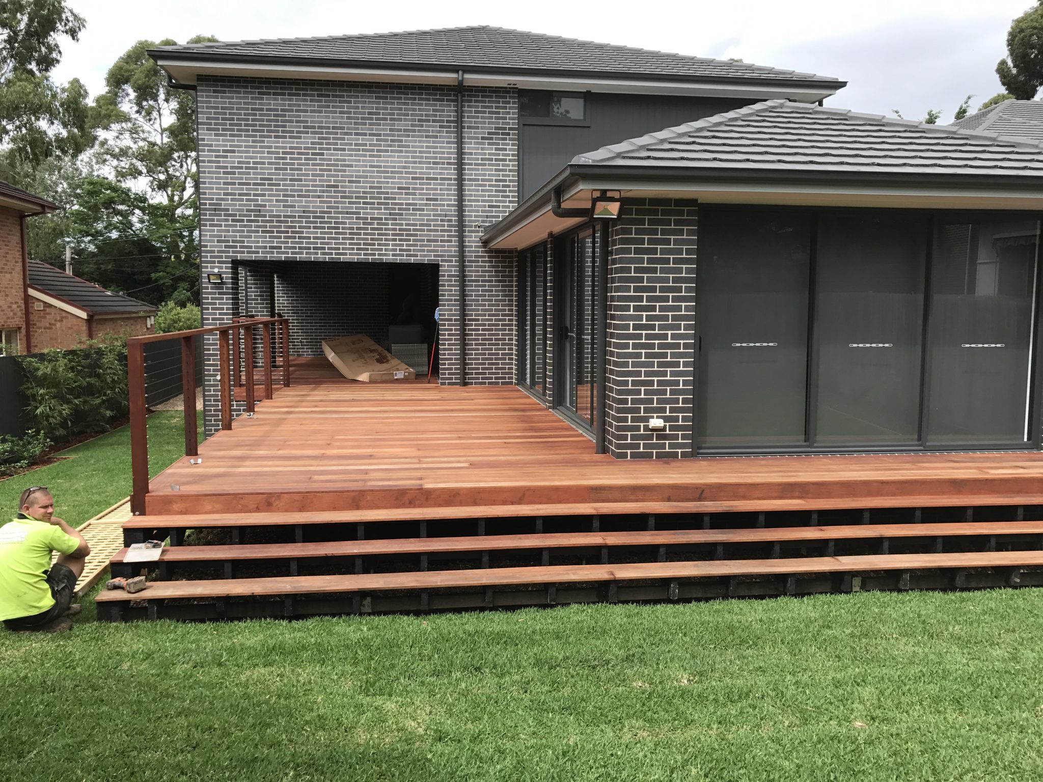 Timber deck with surrounding stairs