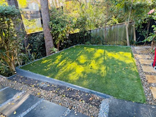 turfed-backyard paved-garden-paths
