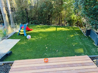timber-bench-seat backyard-lawn